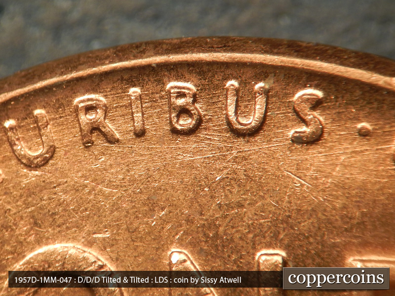 Die-stage C marker on 1957D•1MM•047 (1957 Repunched Mint Mark).