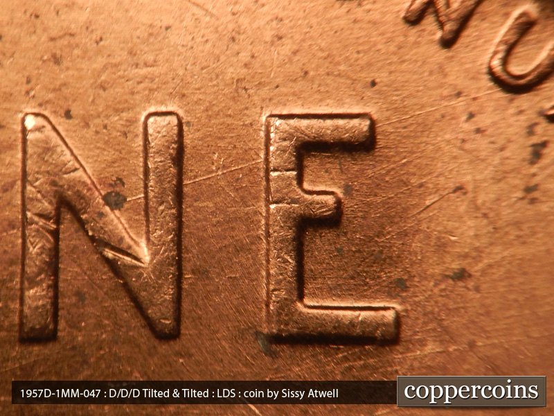 Die-stage C marker on 1957D•1MM•047 (1957 Repunched Mint Mark).