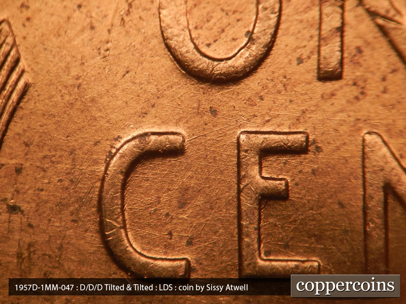 Die-stage C marker on 1957D•1MM•047 (1957 Repunched Mint Mark).