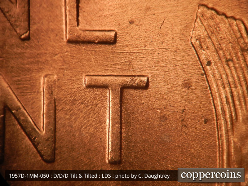 Die-stage C marker on 1957D•1MM•050 (1957 Repunched Mint Mark).