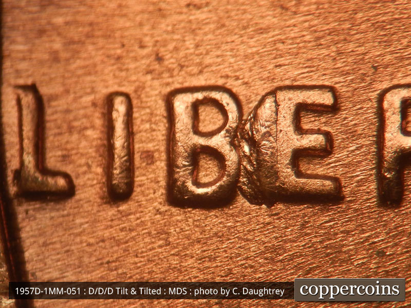 Die-stage B marker on 1957D•1MM•051 (1957 Repunched Mint Mark).