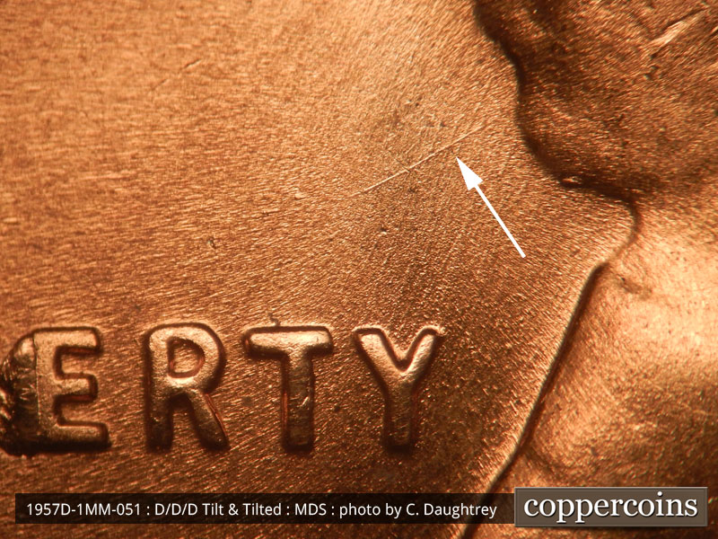 Die-stage B marker on 1957D•1MM•051 (1957 Repunched Mint Mark).