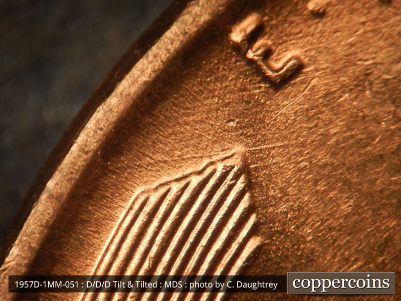 Die-stage B marker on 1957D•1MM•051 (1957 Repunched Mint Mark).
