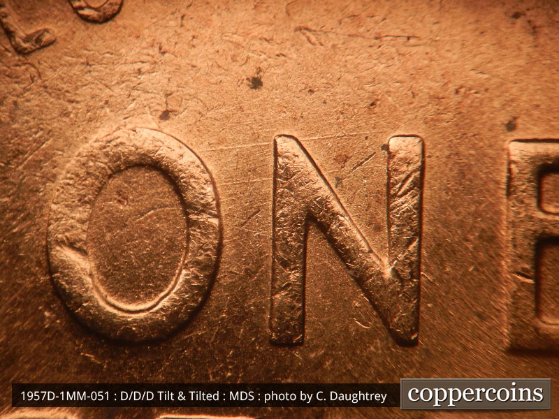 Die-stage B marker on 1957D•1MM•051 (1957 Repunched Mint Mark).