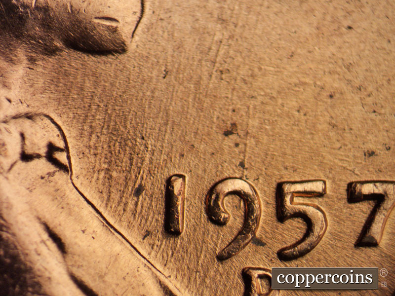 Die-stage B marker on 1957D•1MM•053 (1957 Repunched Mint Mark).