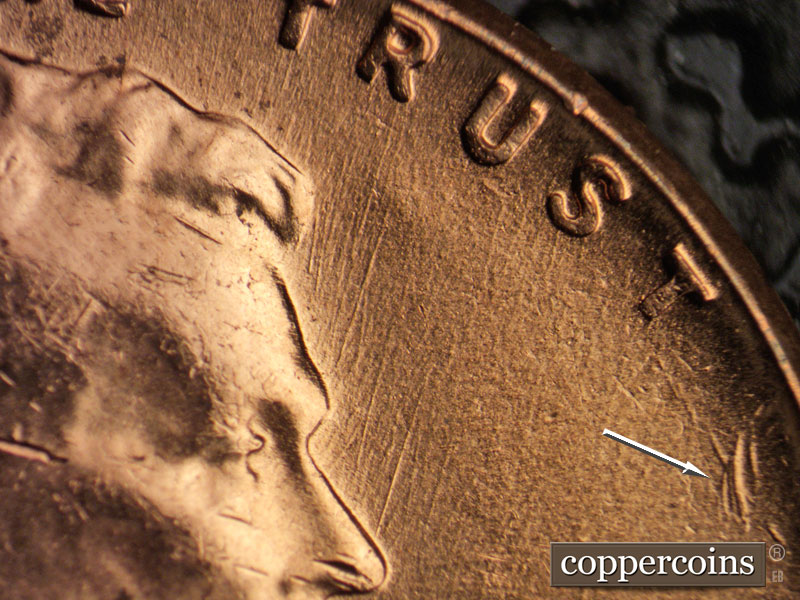 Die-stage B marker on 1957D•1MM•053 (1957 Repunched Mint Mark).