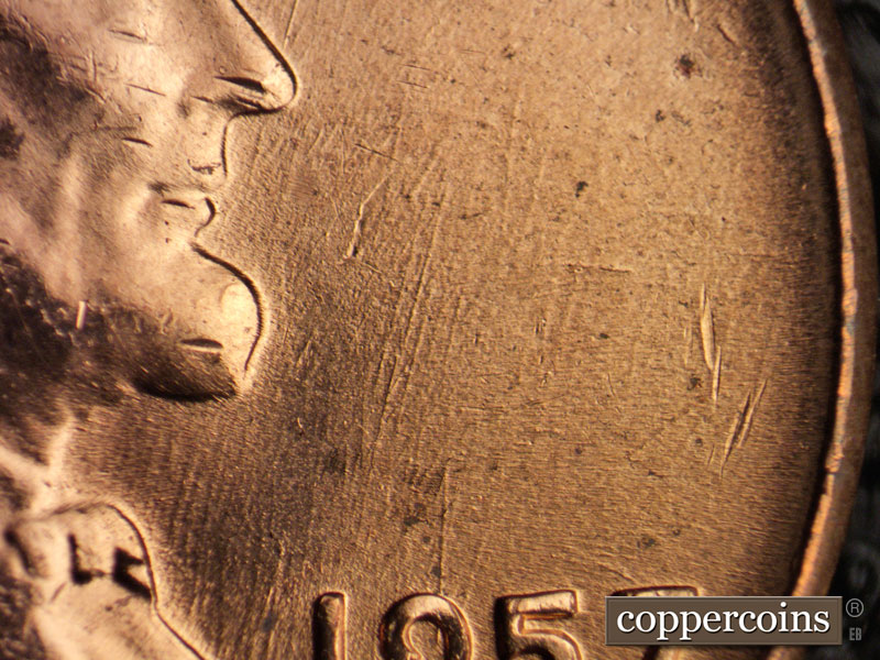 Die-stage B marker on 1957D•1MM•053 (1957 Repunched Mint Mark).