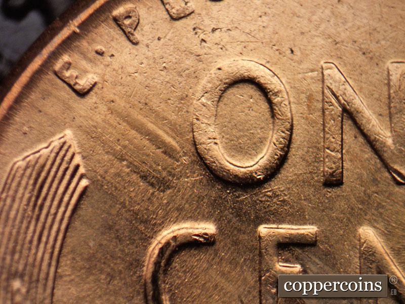 Die-stage B marker on 1957D•1MM•053 (1957 Repunched Mint Mark).