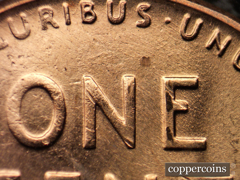Die-stage B marker on 1957D•1MM•053 (1957 Repunched Mint Mark).