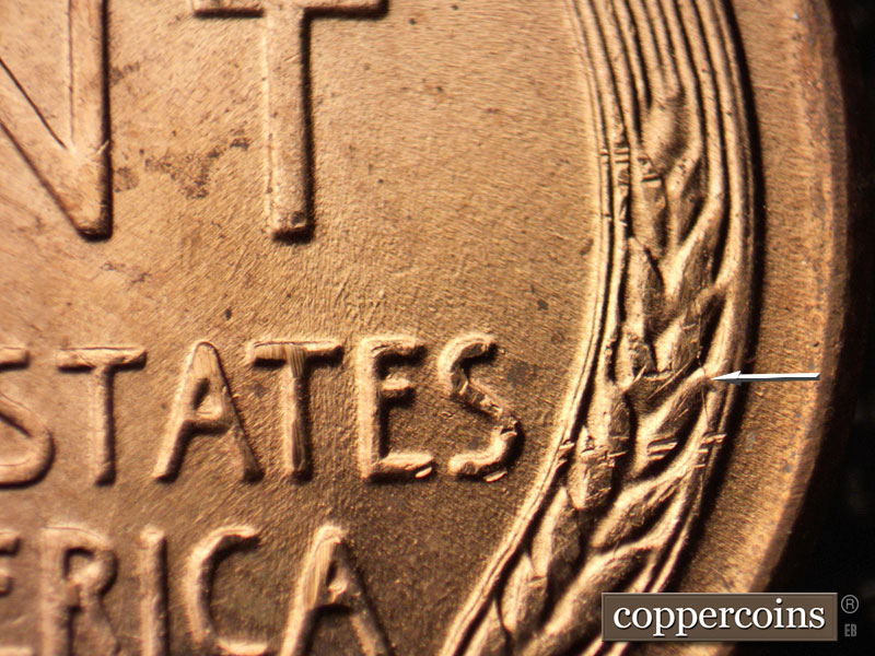 Die-stage B marker on 1957D•1MM•053 (1957 Repunched Mint Mark).