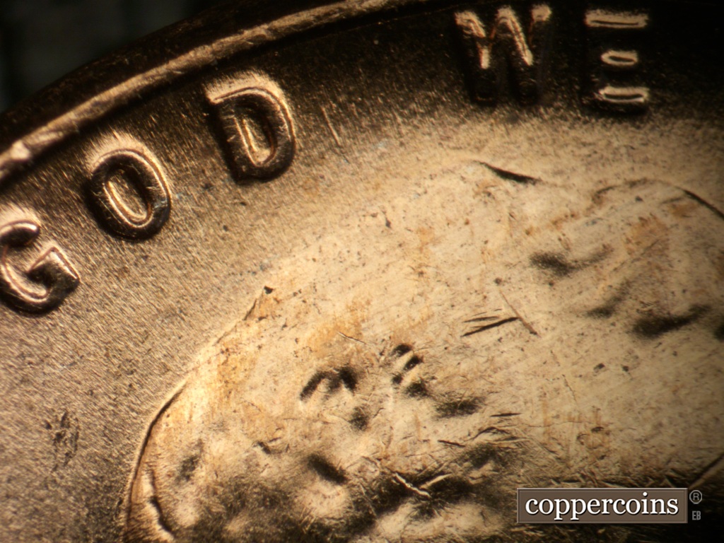 Die-stage C marker on 1957D•1MM•053 (1957 Repunched Mint Mark).