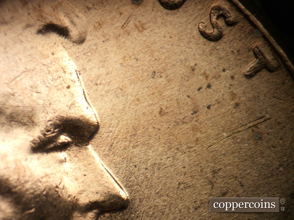 Die-stage C marker on 1957D•1MM•053 (1957 Repunched Mint Mark).