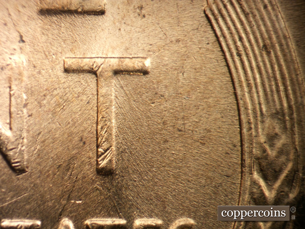 Die-stage C marker on 1957D•1MM•053 (1957 Repunched Mint Mark).