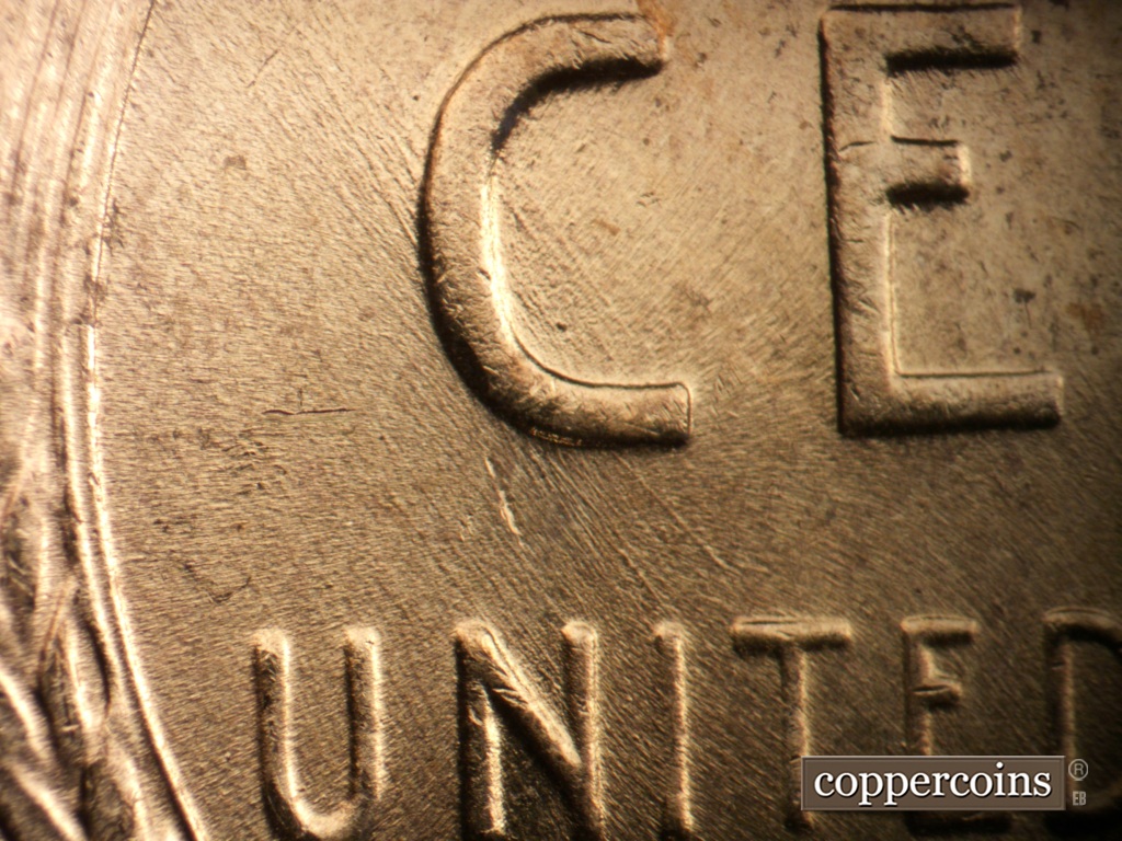 Die-stage C marker on 1957D•1MM•053 (1957 Repunched Mint Mark).