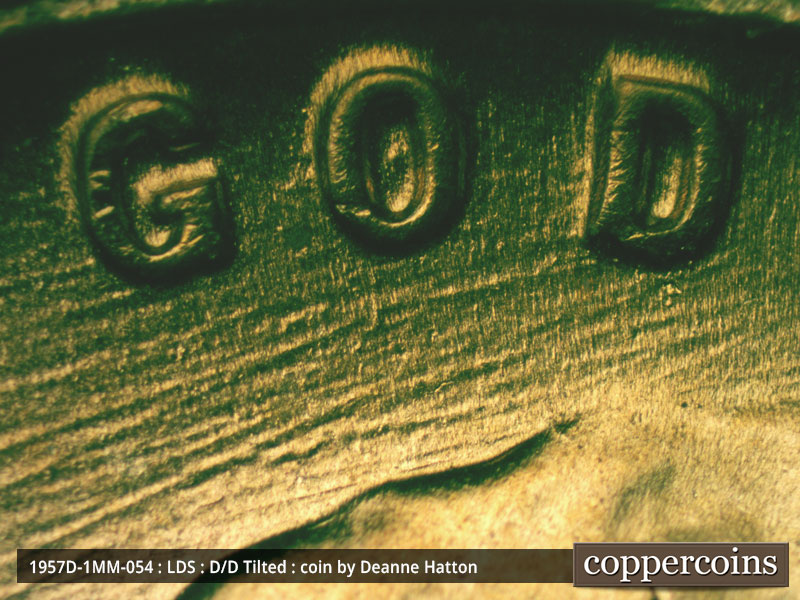 Die-stage C marker on 1957D•1MM•054 (1957 Repunched Mint Mark).