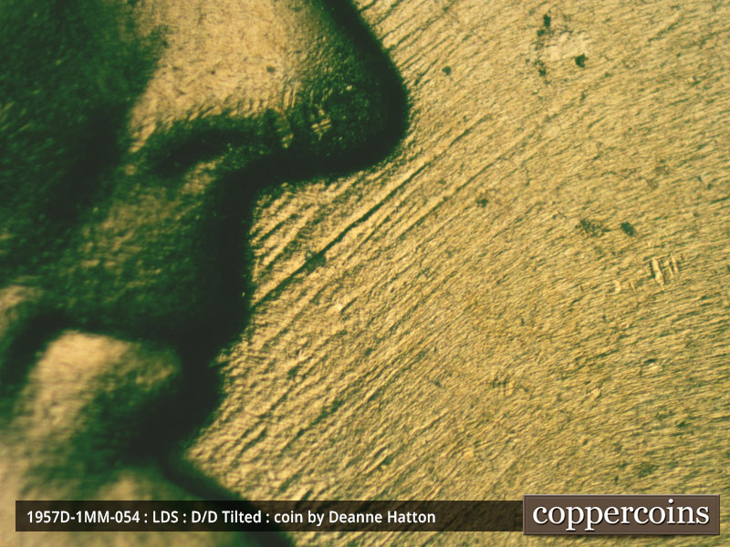 Die-stage C marker on 1957D•1MM•054 (1957 Repunched Mint Mark).