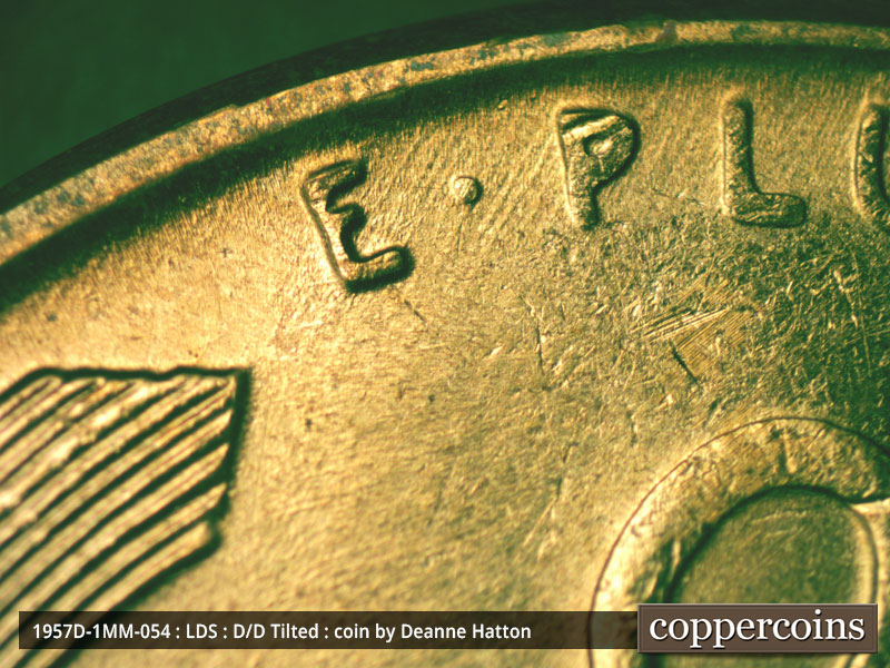 Die-stage C marker on 1957D•1MM•054 (1957 Repunched Mint Mark).