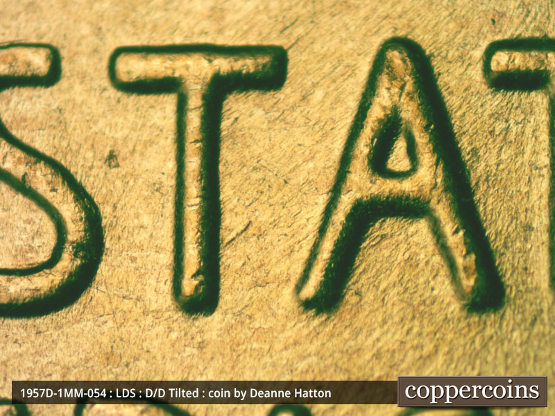 Die-stage C marker on 1957D•1MM•054 (1957 Repunched Mint Mark).