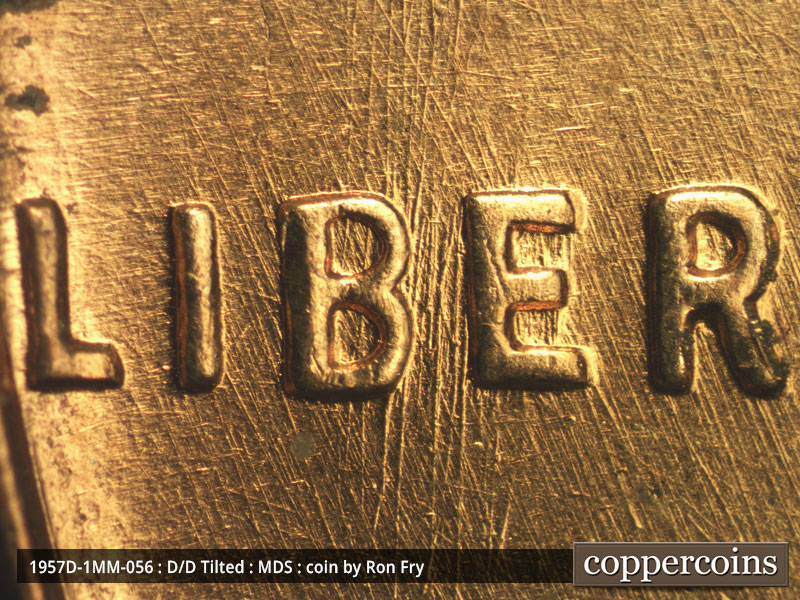Die-stage B marker on 1957D•1MM•056 (1957 Repunched Mint Mark).
