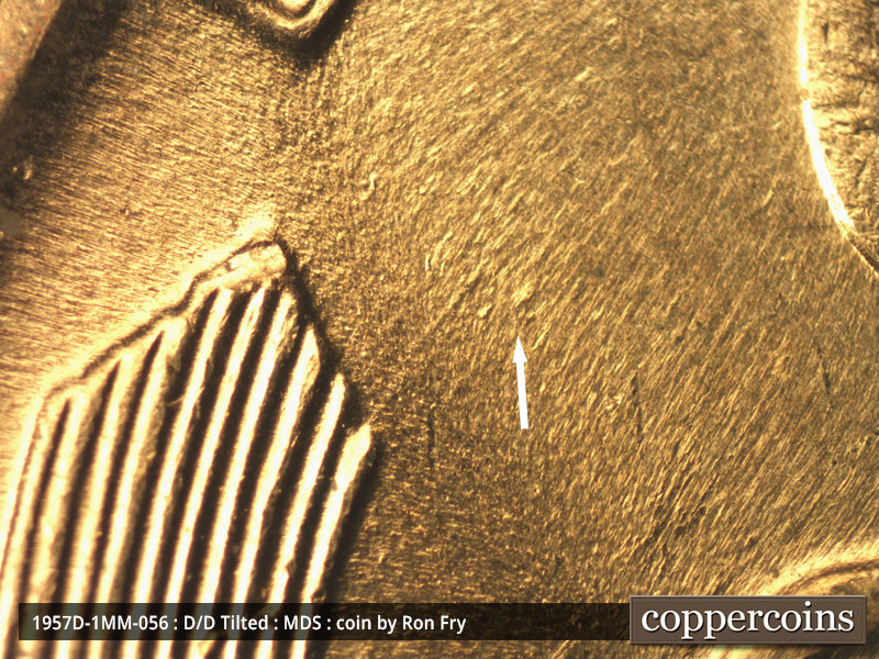 Die-stage B marker on 1957D•1MM•056 (1957 Repunched Mint Mark).