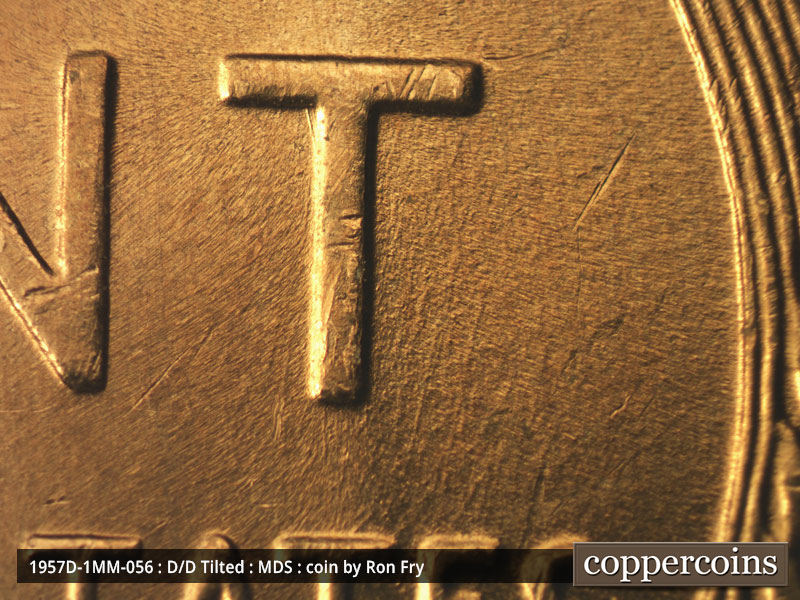 Die-stage B marker on 1957D•1MM•056 (1957 Repunched Mint Mark).