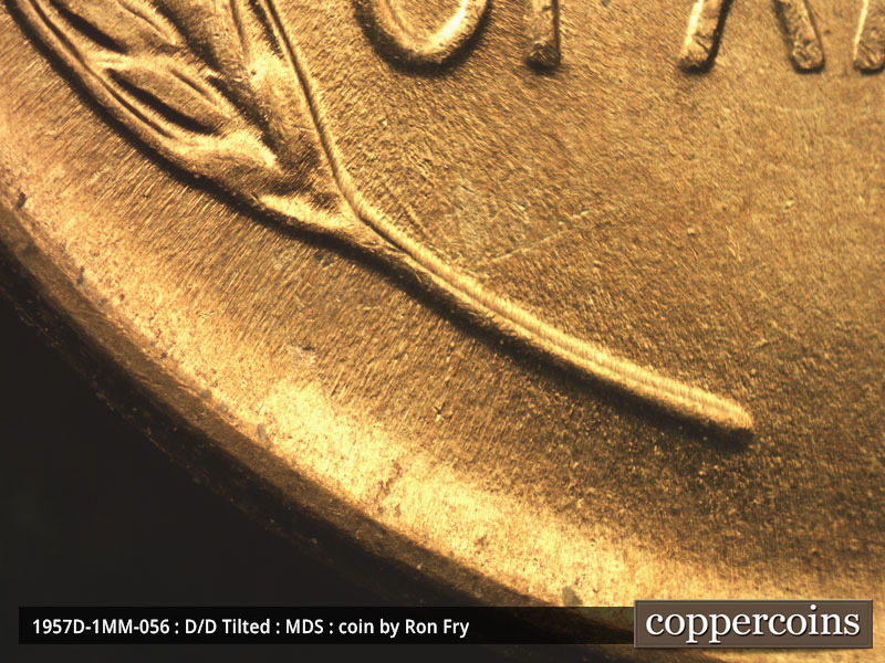 Die-stage B marker on 1957D•1MM•056 (1957 Repunched Mint Mark).