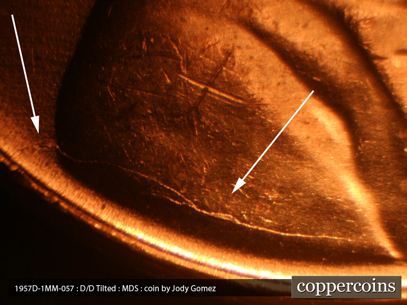 Die-stage B marker on 1957D•1MM•057 (1957 Repunched Mint Mark).