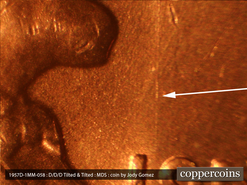 Die-stage B marker on 1957D•1MM•058 (1957 Repunched Mint Mark).
