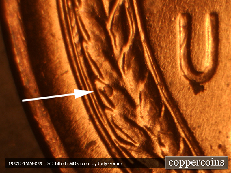 Die-stage B marker on 1957D•1MM•059 (1957 Repunched Mint Mark).