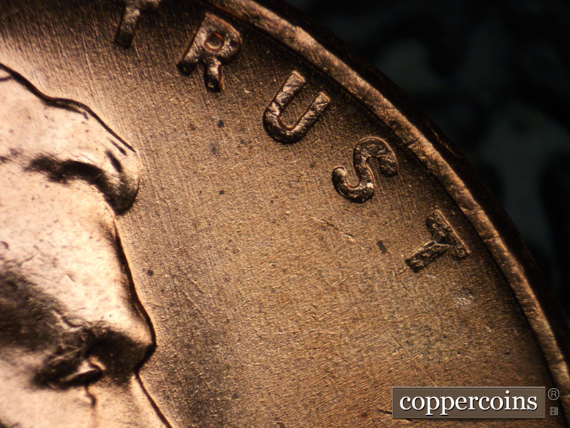 Die-stage A marker on 1957D•1MM•064 (1957 Repunched Mint Mark).