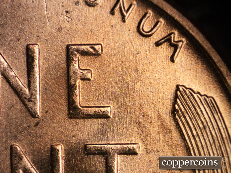 Die-stage A marker on 1957D•1MM•064 (1957 Repunched Mint Mark).