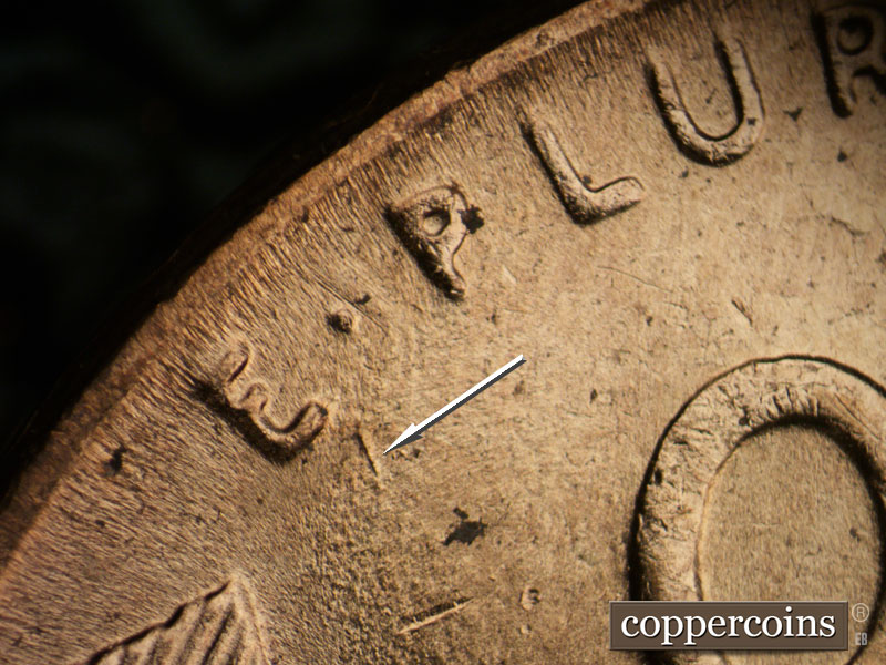 Die-stage B marker on 1957D•1MM•065 (1957 Repunched Mint Mark).