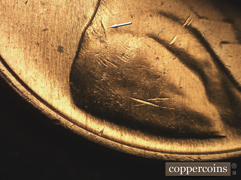 Die-stage C marker on 1957D•1MM•065 (1957 Repunched Mint Mark).