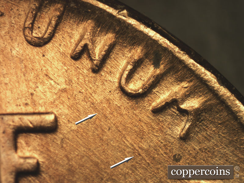 Die-stage C marker on 1957D•1MM•065 (1957 Repunched Mint Mark).