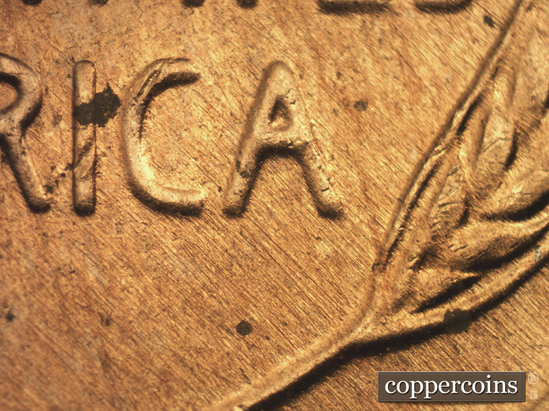 Die-stage C marker on 1957D•1MM•065 (1957 Repunched Mint Mark).