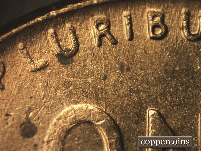 Die-stage B marker on 1957D•1MM•066 (1957 Repunched Mint Mark).