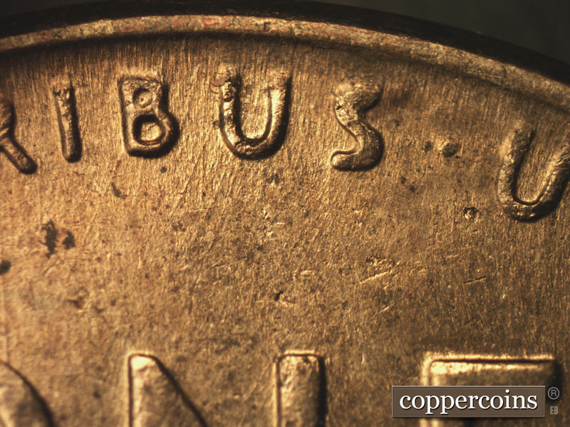 Die-stage B marker on 1957D•1MM•066 (1957 Repunched Mint Mark).