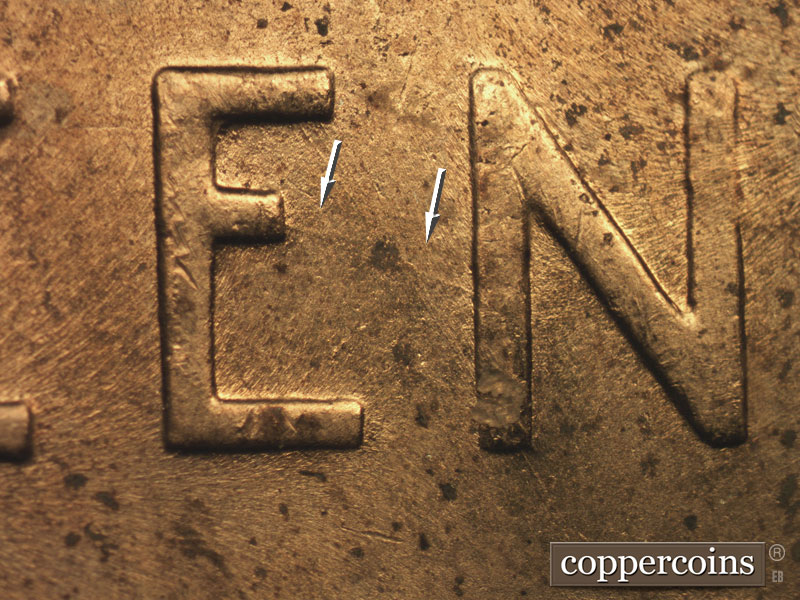 Die-stage B marker on 1957D•1MM•066 (1957 Repunched Mint Mark).