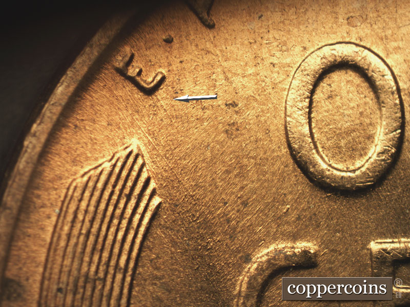 Die-stage B marker on 1957D•1MM•067 (1957 Repunched Mint Mark).