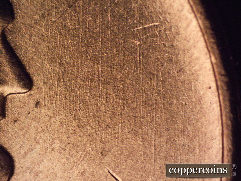 Die-stage B marker on 1957D•1MM•068 (1957 Repunched Mint Mark).