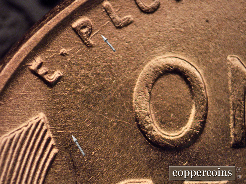 Die-stage B marker on 1957D•1MM•068 (1957 Repunched Mint Mark).