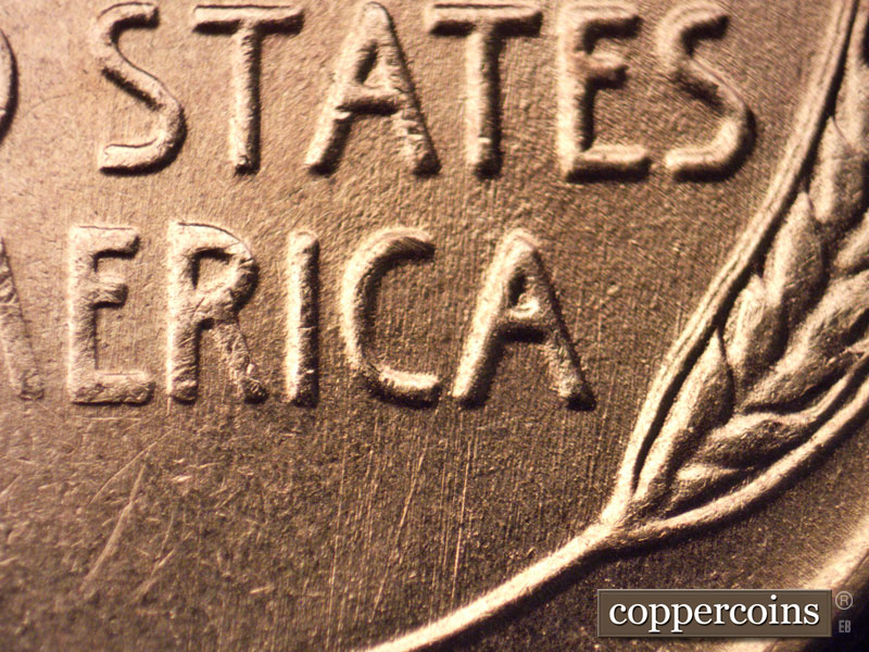 Die-stage B marker on 1957D•1MM•068 (1957 Repunched Mint Mark).