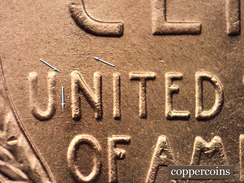 Die-stage B marker on 1957D•1MM•068 (1957 Repunched Mint Mark).
