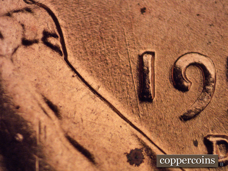 Die-stage B marker on 1957D•1MM•069 (1957 Repunched Mint Mark).