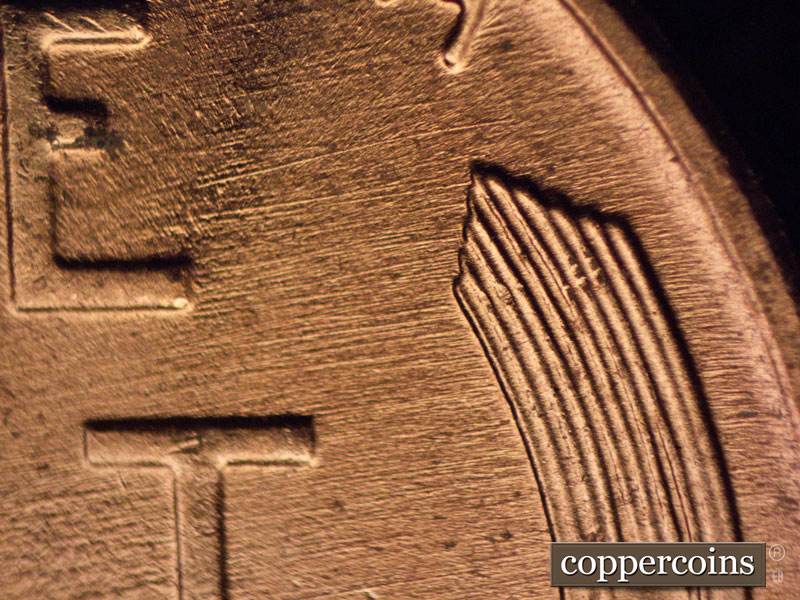 Die-stage B marker on 1957D•1MM•069 (1957 Repunched Mint Mark).