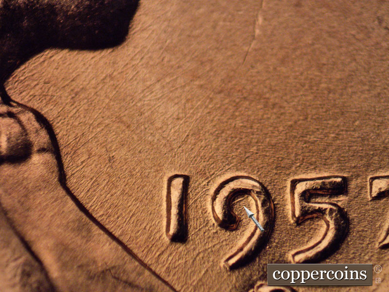 Die-stage B marker on 1957D•1MM•070 (1957 Repunched Mint Mark).