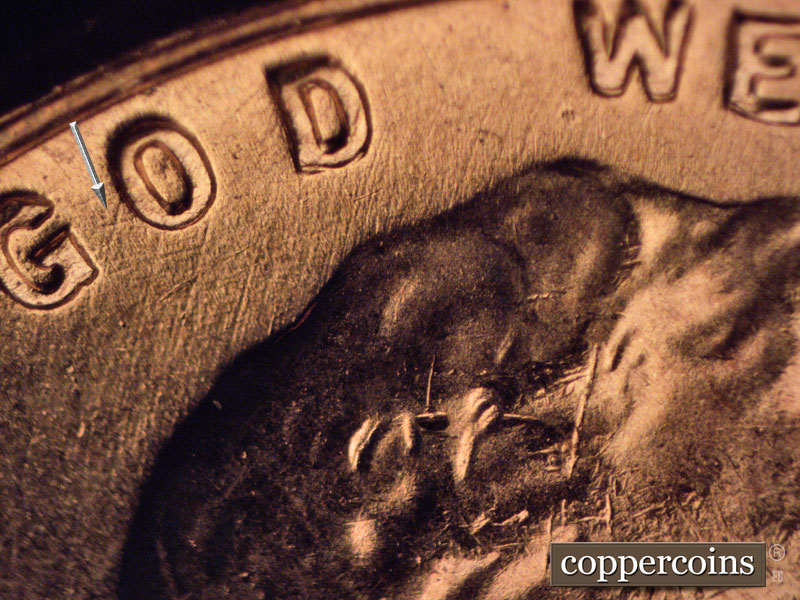 Die-stage B marker on 1957D•1MM•070 (1957 Repunched Mint Mark).