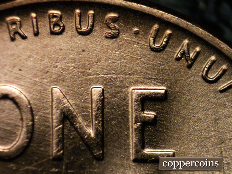 Die-stage B marker on 1957D•1MM•071 (1957 Repunched Mint Mark).