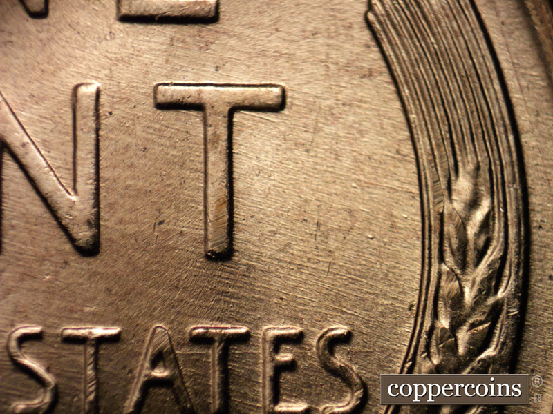 Die-stage B marker on 1957D•1MM•071 (1957 Repunched Mint Mark).