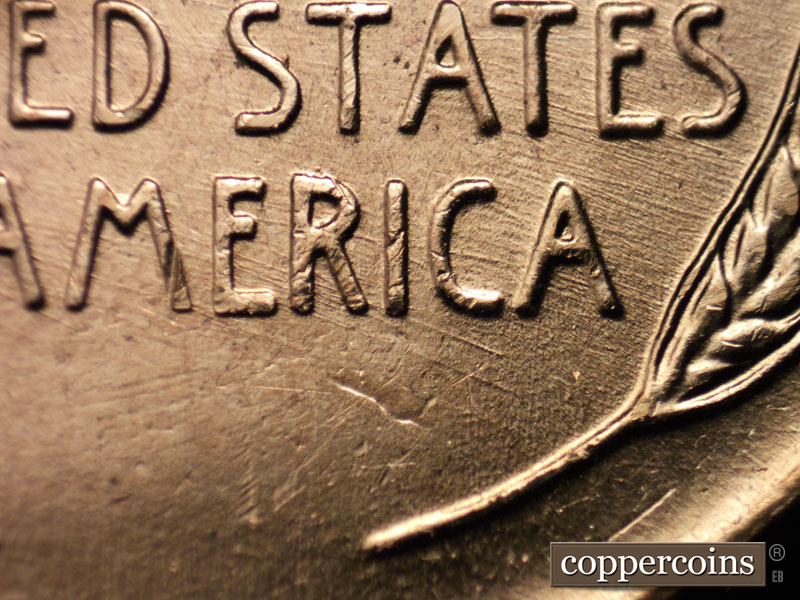 Die-stage B marker on 1957D•1MM•071 (1957 Repunched Mint Mark).